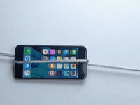 视频：城会玩 iPhone 6s被钢丝缠绞活活“虐杀”