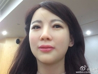 告诉我她美不美！中国首个美女机器人问世